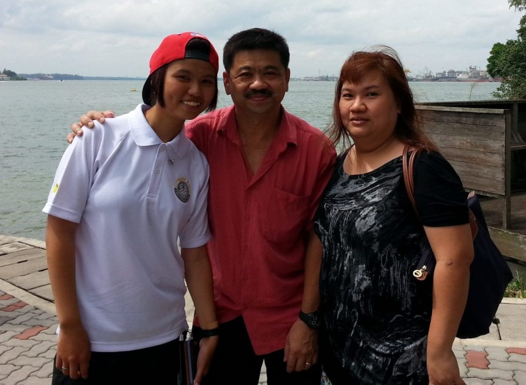 Ang Yi Min and parents